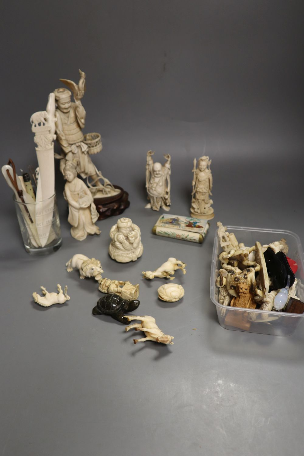 A group of Japanese and Chinese ivory figures and carvings, 19th/early 20th century, tallest 24cm